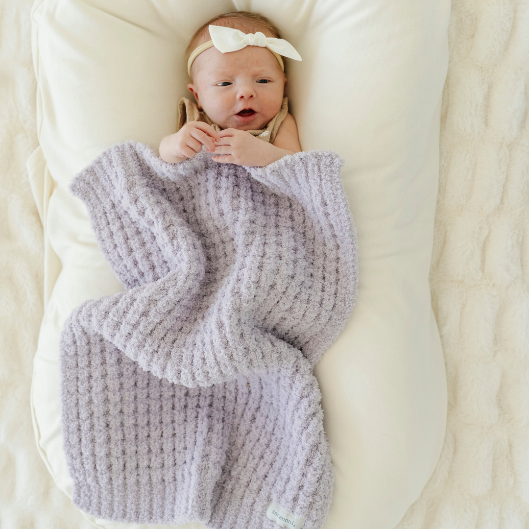 Wisteria Saranoni Waffle Knit Mini Blanket brings sweet airy texture and blends plush softness, perfect for Baby girl blankets.