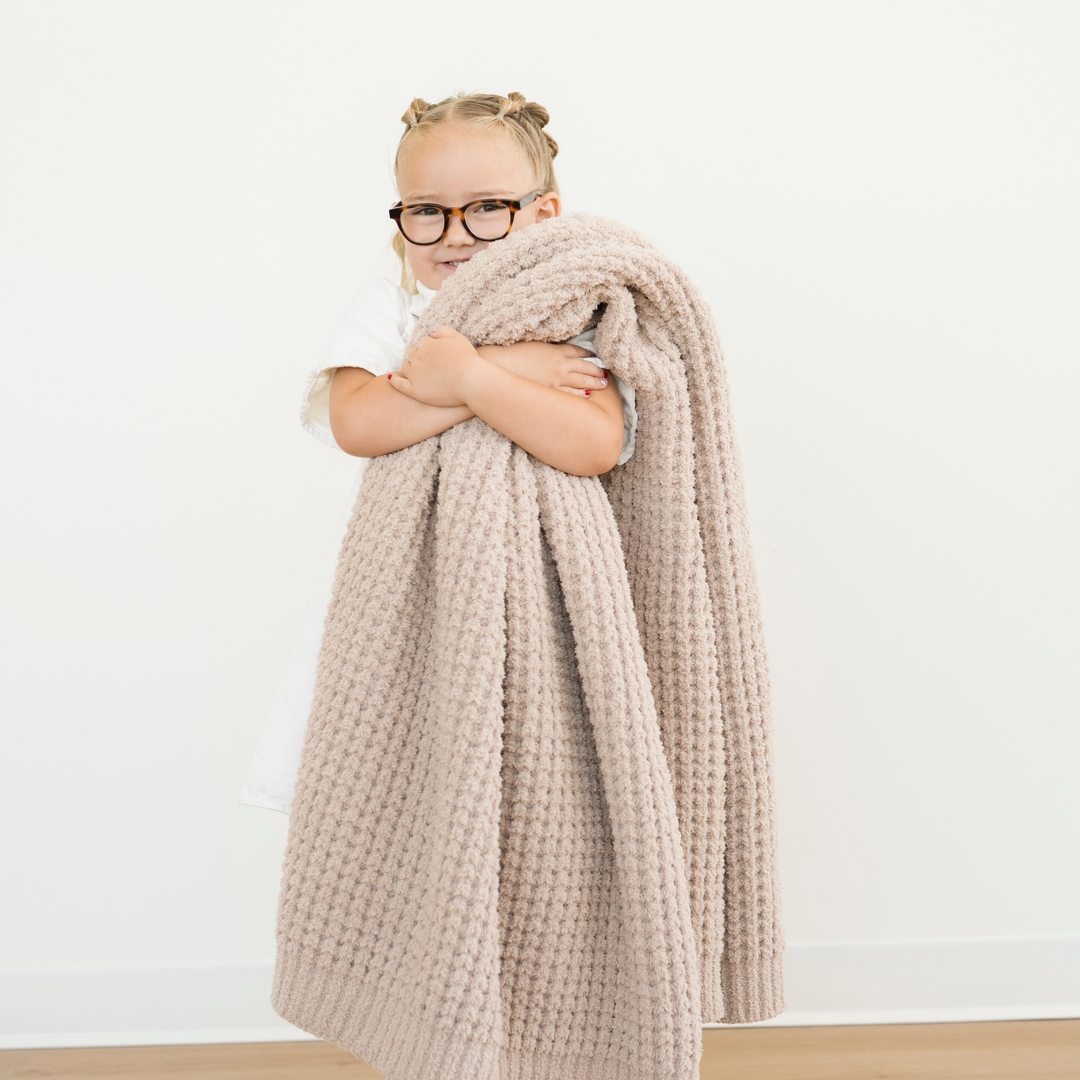In Wheat, this Saranoni Waffle Knit Toddler Blanket ensures cozy naps, a true best blanket for toddler comfort.
