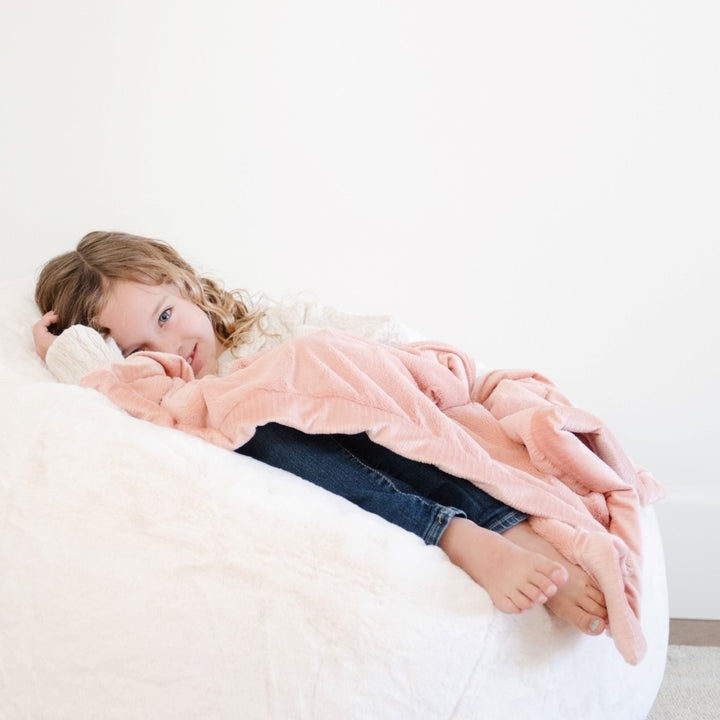 Saranoni Lush Mini Blanket in Blossom pairs plush texture with a gentle feel that elevates baby girl blankets gifting.