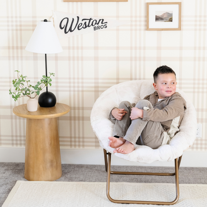 Saranoni Saucer Chair in Cream provides a cozy kids chair perfect for lounging or reading.