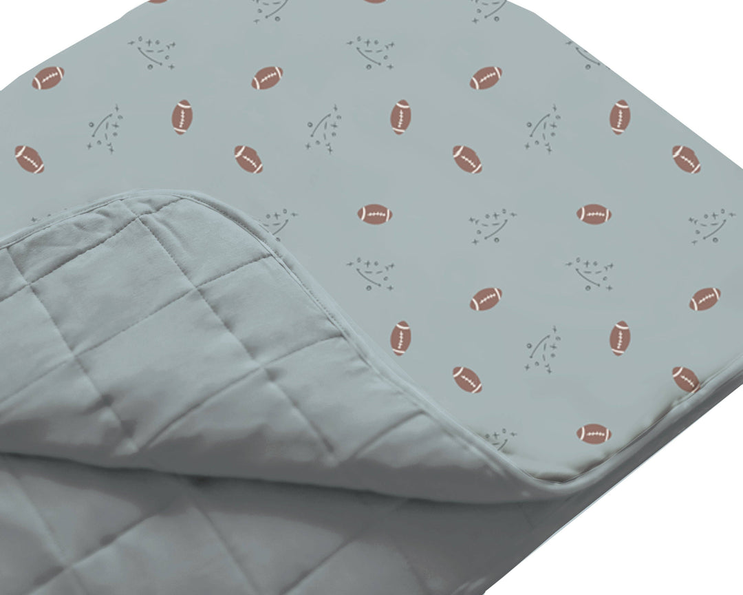 Gunamuna Football Comforter Blanket in cream, baby girl blankets for soft comfort.
