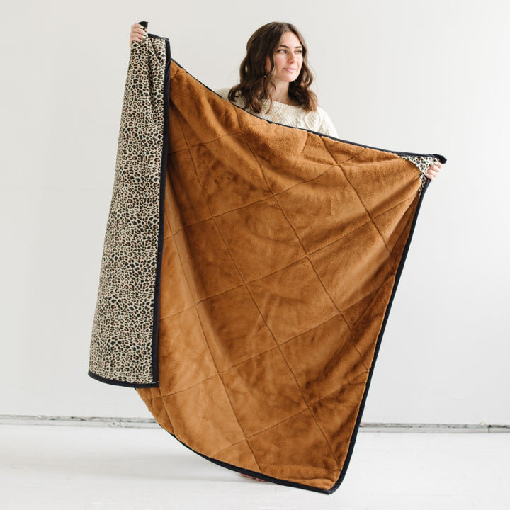Make every outing cozy with Saranoni Outdoor Blanket Leopard, one of the best toddler blankets.
