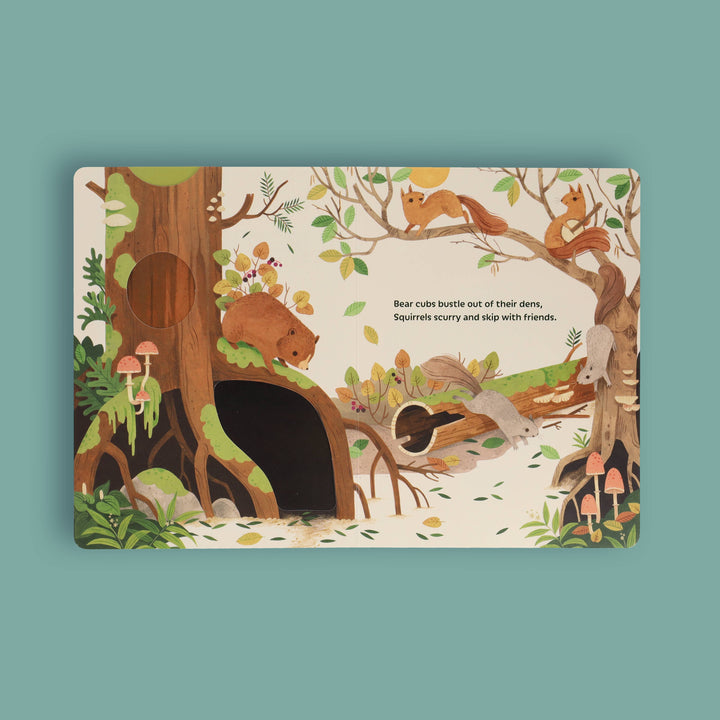 Bear cub burrow scene from Sunrise Dance pull-tab morning board book