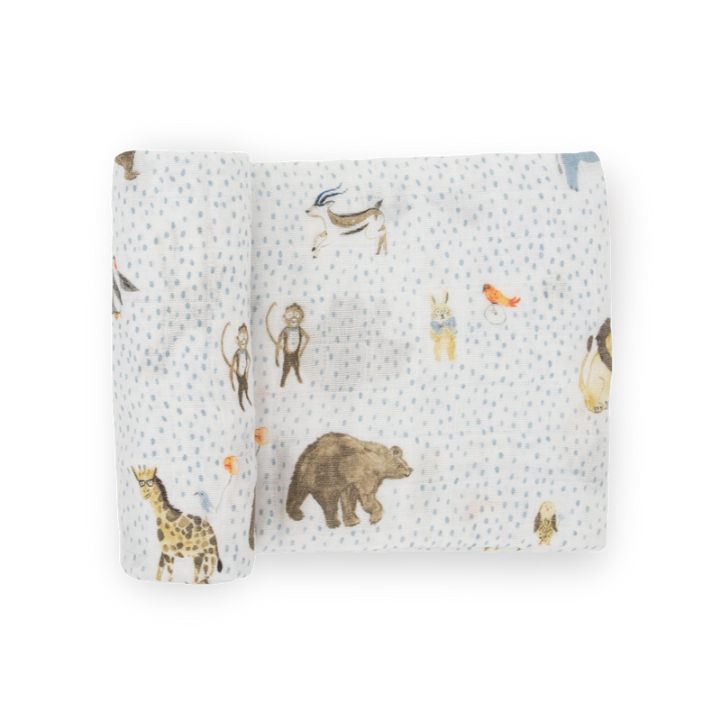 Soft Party Animals muslin swaddle by Little Unicorn, ideal for newborn comfort and cozy naps.