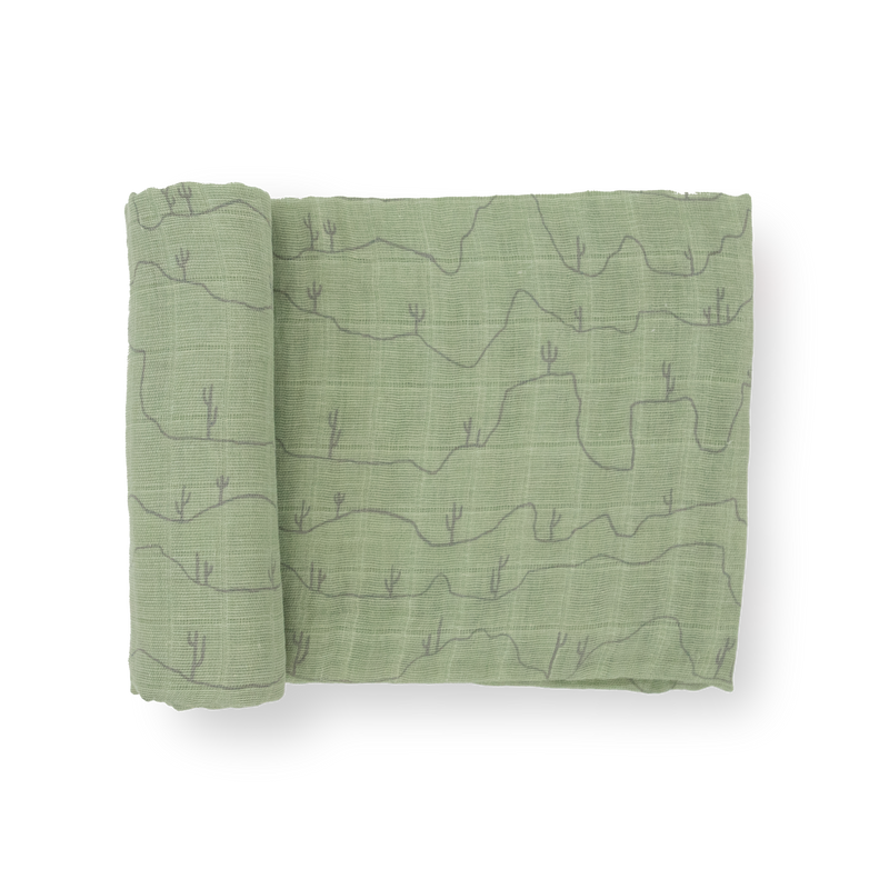Little Unicorn Cotton Muslin Swaddle Blanket - Cactus Lines soft muslin blankets perfect for swaddling infants.