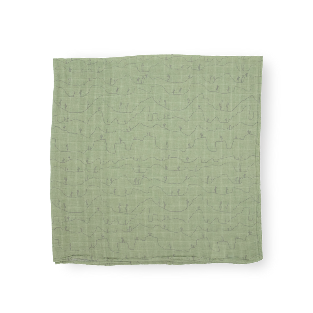 Little Unicorn Cotton Muslin Swaddle Blanket - Cactus Lines offers breathable muslin baby blankets for cozy naps.