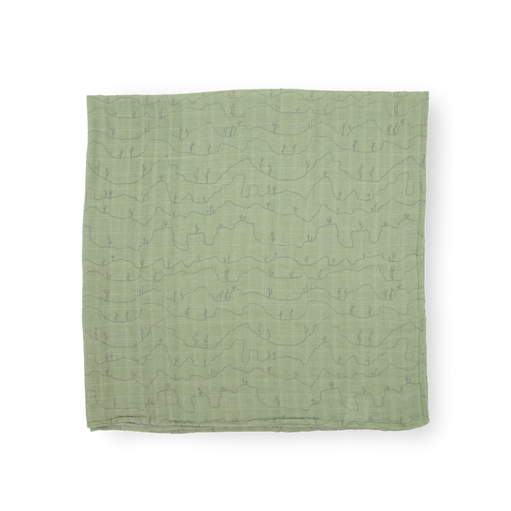 Little Unicorn Cotton Muslin Swaddle Blanket - Cactus Lines offers breathable muslin baby blankets for cozy naps.
