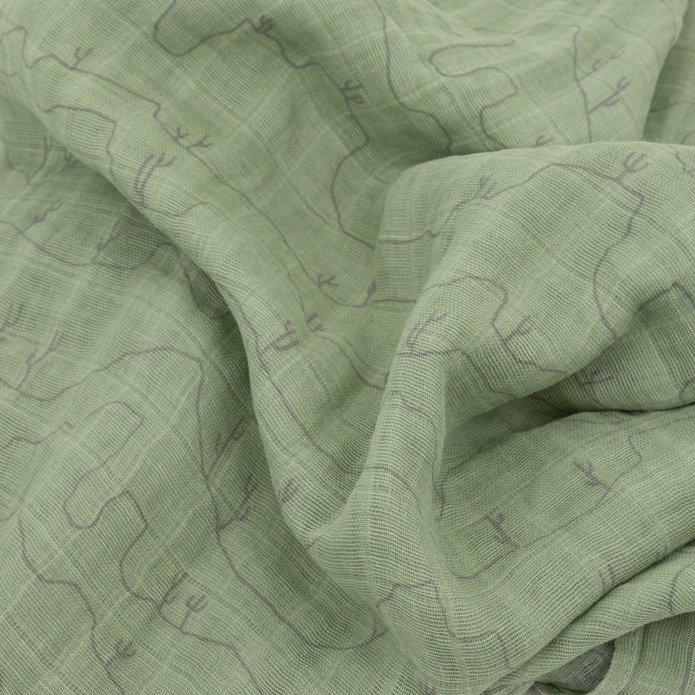 Wrap your baby in comfort with the Little Unicorn Cotton Muslin Swaddle Blanket - Cactus Lines, a gentle muslin swaddle.