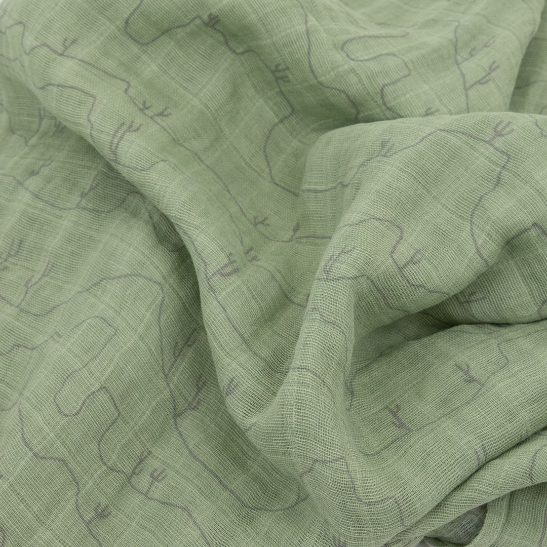 Wrap your baby in Little Unicorn Desert Night Muslin Swaddle Blanket 3 Pack, swaddling muslin blanket