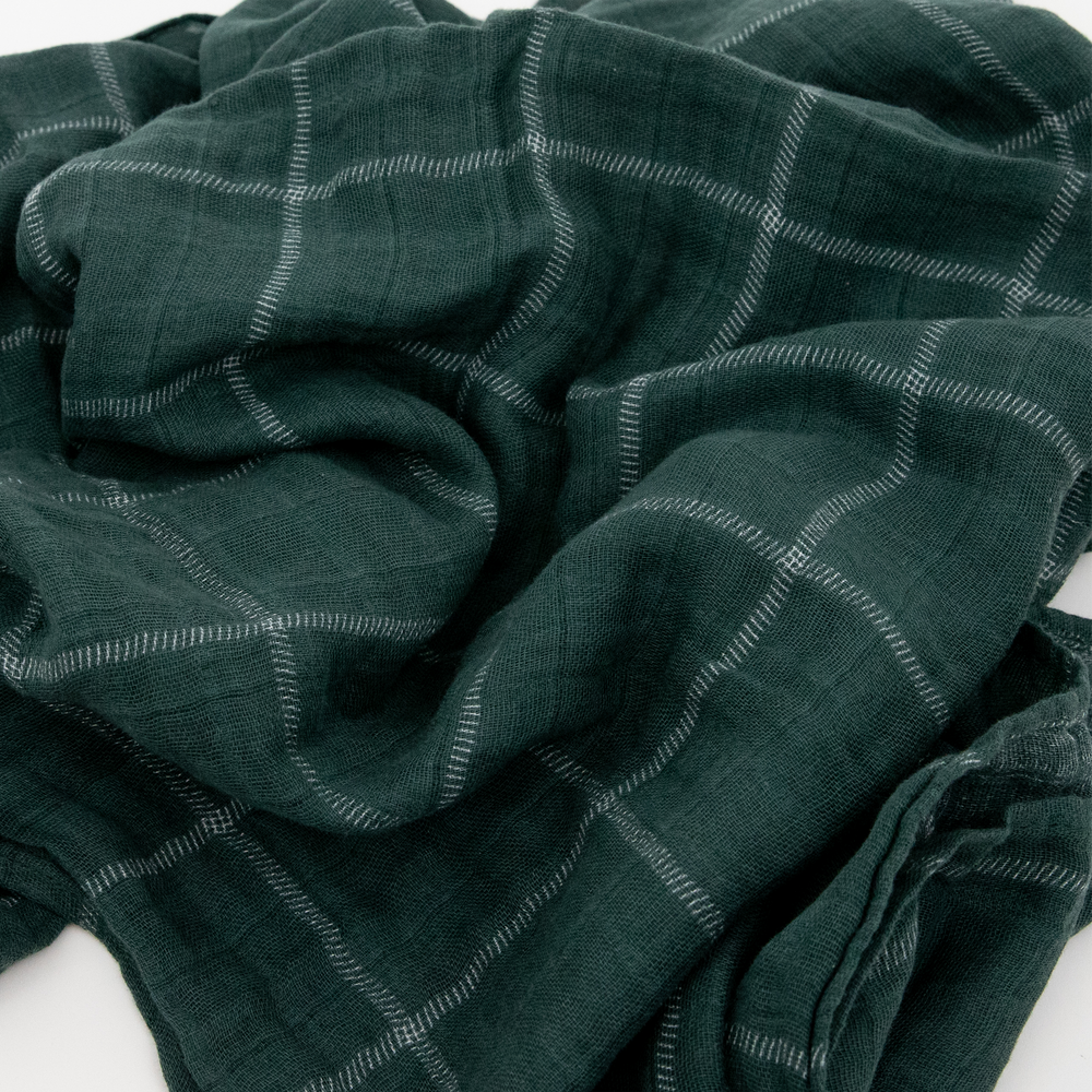 Evergreen Plaid muslin blanket by Little Unicorn, gentle and breathable for baby comfort.