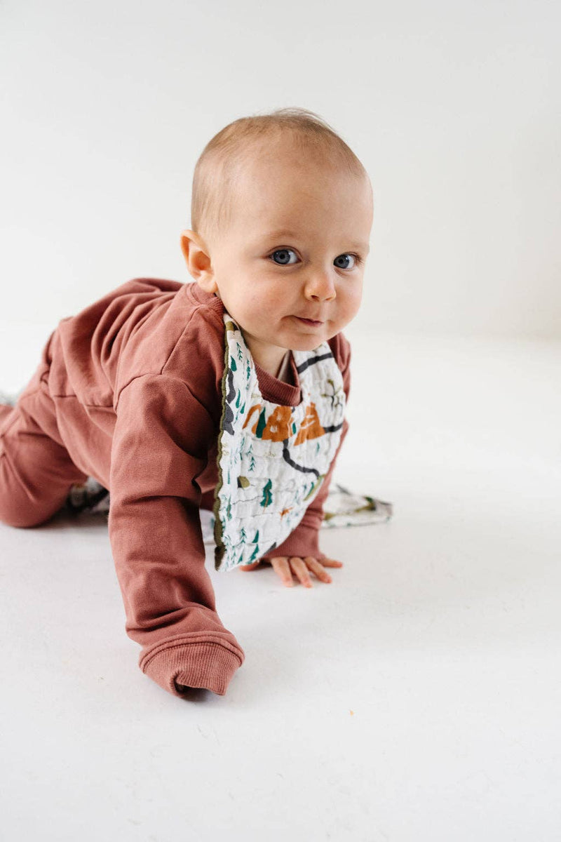 baby muslin cotton bib in forrest print 