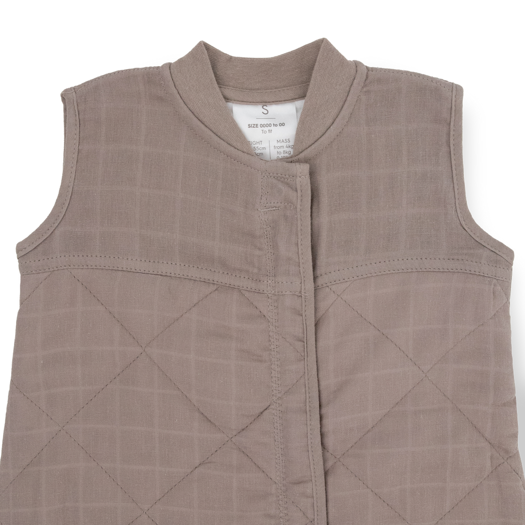 Soft and warm, the Little Unicorn Cotton Muslin Quilted Sleep Bag - Mocha is an ideal infant sleeping bag.