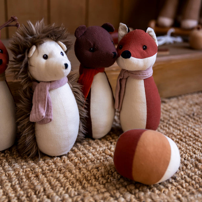 showcase of assorted items in egmont toys forest bowling game displayed on carpet