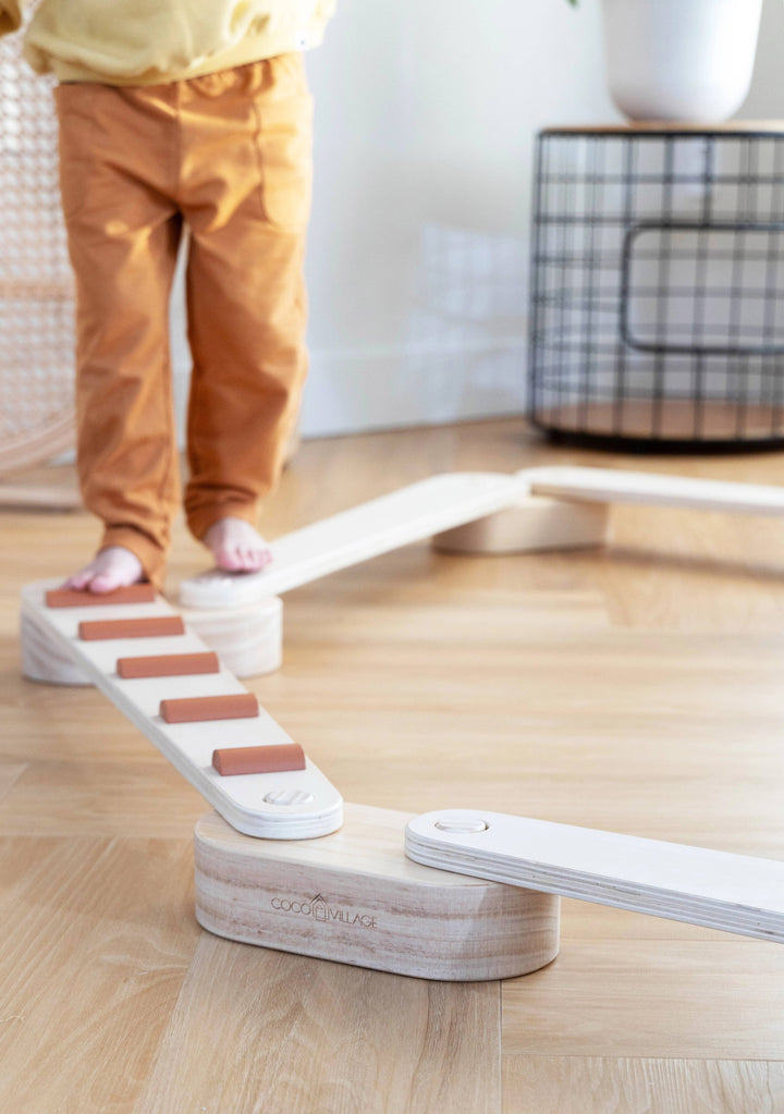 Guide development through the Coco Village Wooden Balance Beams Set in Natural, a great choice for toddler toys.