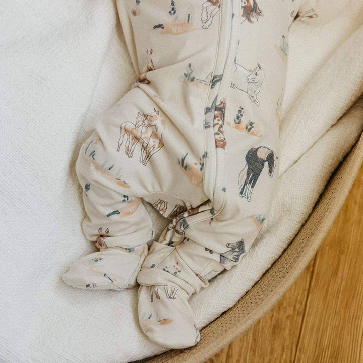 Copper Pearl Montana zip-up sleeper detail showing zipper and fabric, infant pajamas for easy changes and breathable comfort