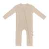 kyte zip up romper in almond