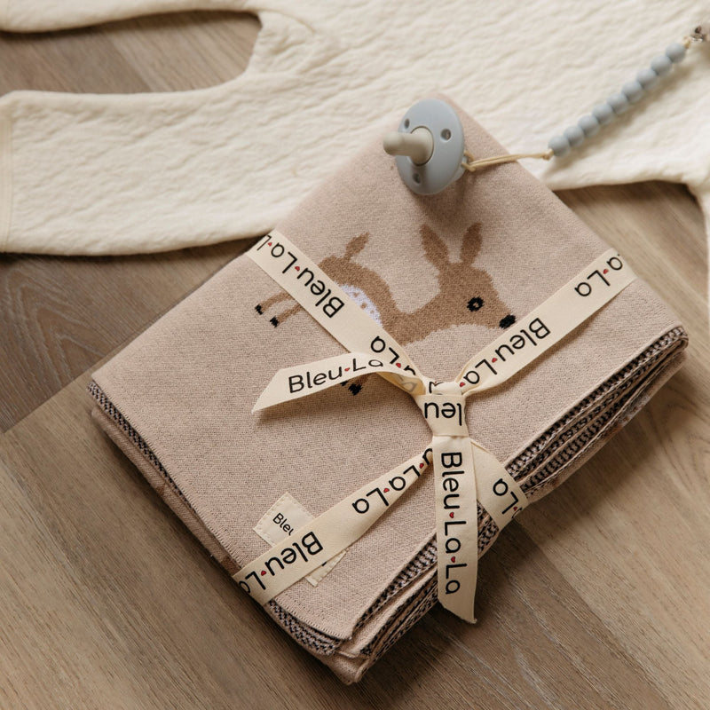 Blue Bleu La La knit unicorn blanket folded flat, soft cotton baby blanket with timeless design