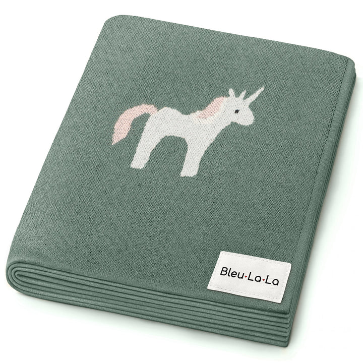 Cream Bleu La La knit unicorn blanket folded flat, neutral cotton baby blanket for nursery styling