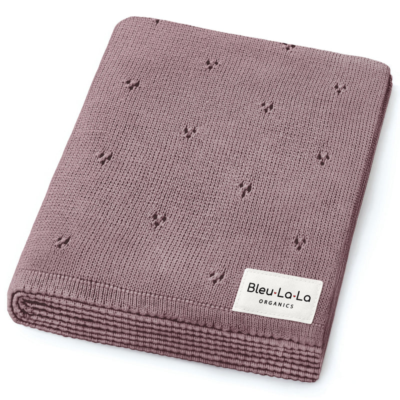 Bleu La La Organic Pointelle Luxury Knit Swaddle Blanket in sugar plum, folded for everyday swaddling and stroller use.