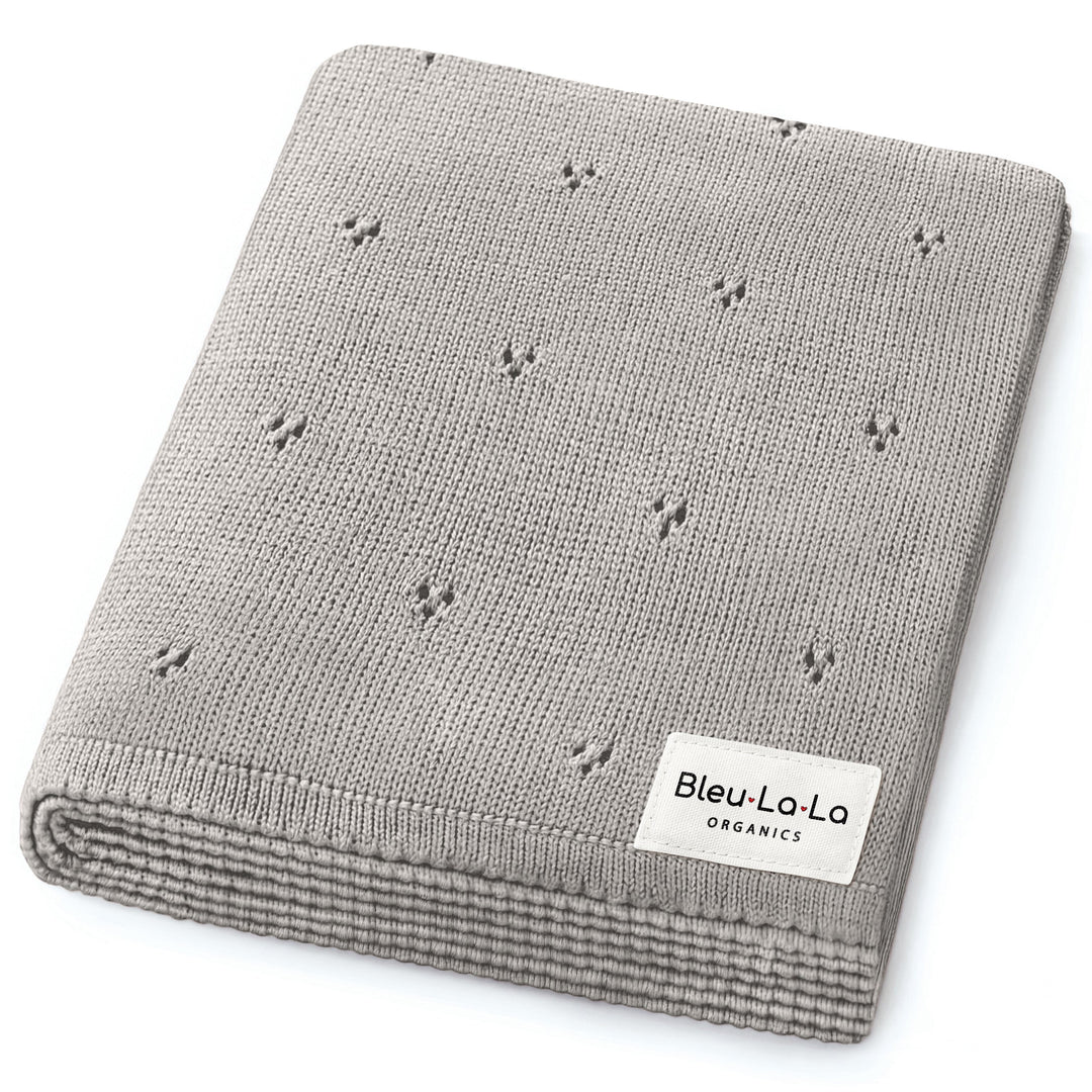 Bleu La La Organic Pointelle Luxury Knit Swaddle Blanket in dove gray, folded to show lightweight breathable construction.
