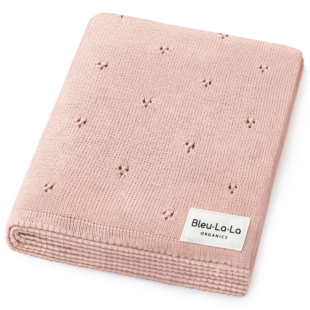 Bleu La La Organic Pointelle Luxury Knit Swaddle Blanket in ballet slipper, folded to showcase breathable knit texture.