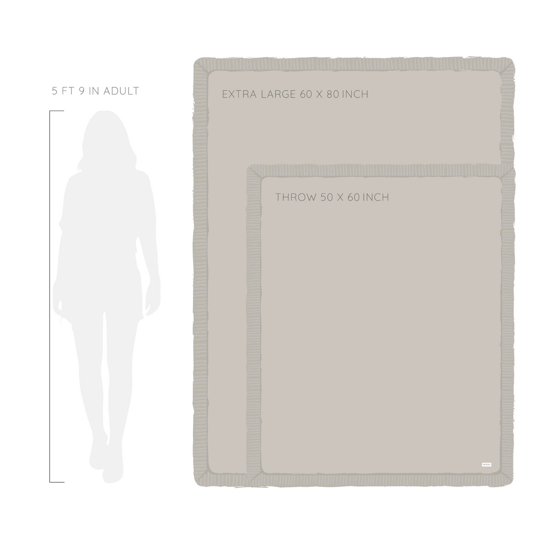 Nothing beats the comforting plushness of the Saranoni Double Ruched Faux Throw Blanket when shopping for a luxe Throw Blanket.