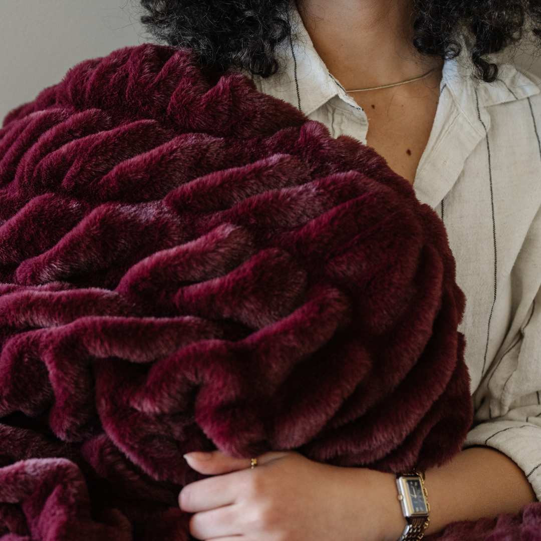 The Royale Colorway proves that indulgence matters with the Saranoni Double Ruched Faux Throw Blanket, considered the Best throw blanket pick.