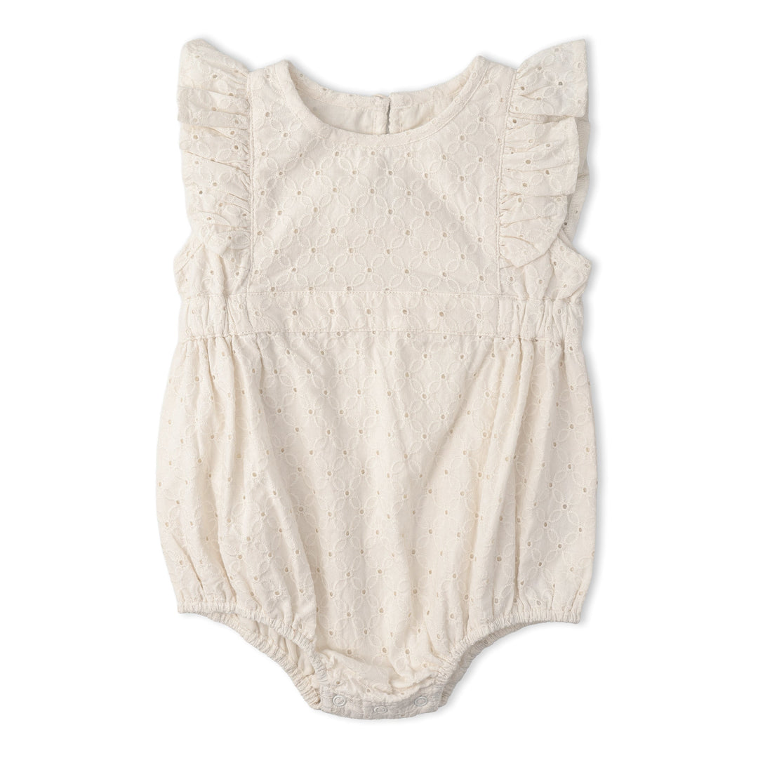 Baby wearing MakeMake Organics Ivory Eyelet Romper - GOTS certified flutter sleeve infant one-piece