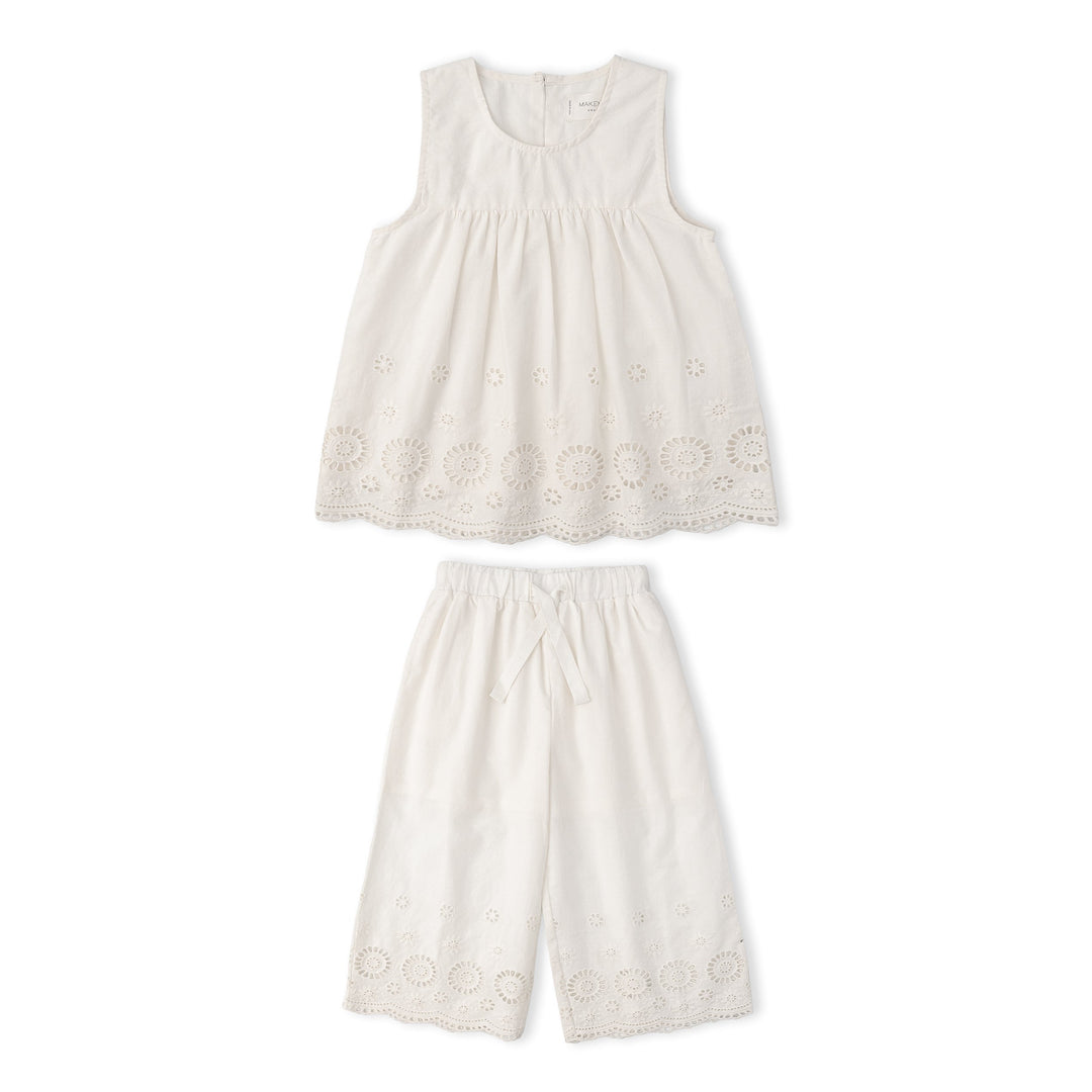 Toddler wearing MakeMake Organics Ivory Eyelet Top Pant Set - organic cotton wide-leg toddler outfit