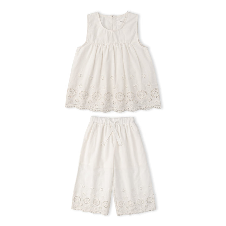 Toddler wearing MakeMake Organics Ivory Eyelet Top Pant Set - organic cotton wide-leg toddler outfit