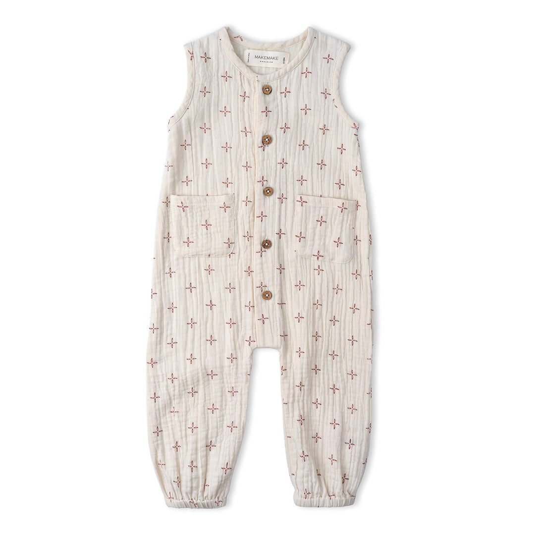 Baby wearing MakeMake Organics Cross Buttoned Jumpsuit - tailored organic infant one-piece