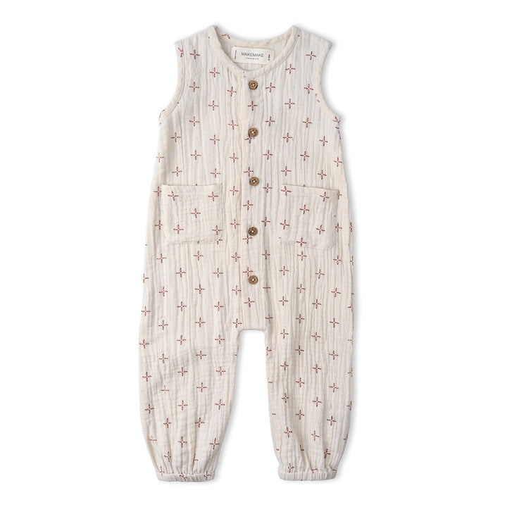 Baby wearing MakeMake Organics Cross Buttoned Jumpsuit - tailored organic infant one-piece