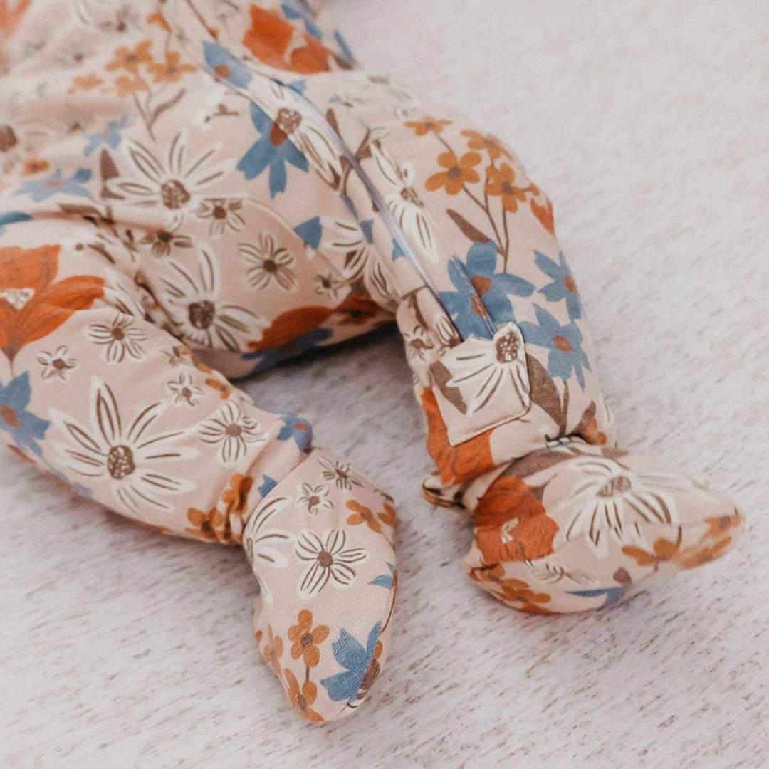 Detail of Copper Pearl Eden footed pajama fabric, breathable baby sleepwear for sensitive skin and cozy comfort