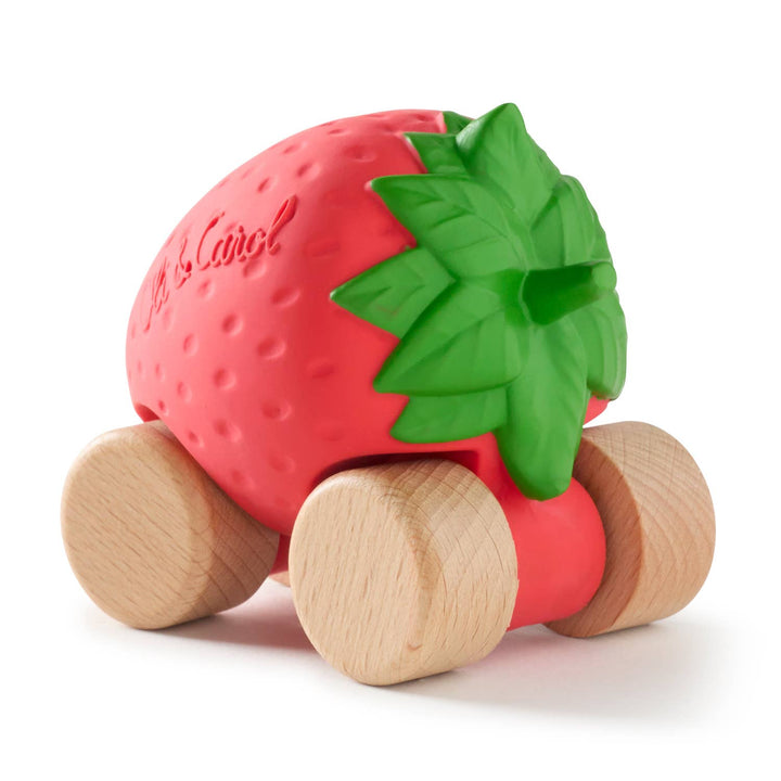 Angled view of the Sweetie the Strawberry Baby Car showing its chunky wheels and leaves