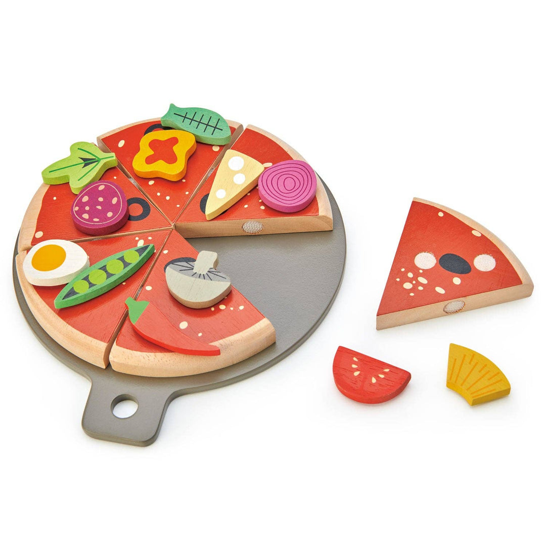 Pizza Party from Tender Leaf Toys with one slice removed and toppings displayed nearby