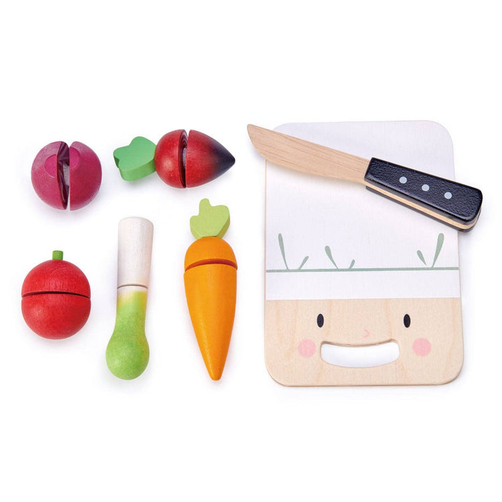 Close up of leek, radish, and knife accessories from the Mini Chef Chopping Board by Tender Leaf Toys