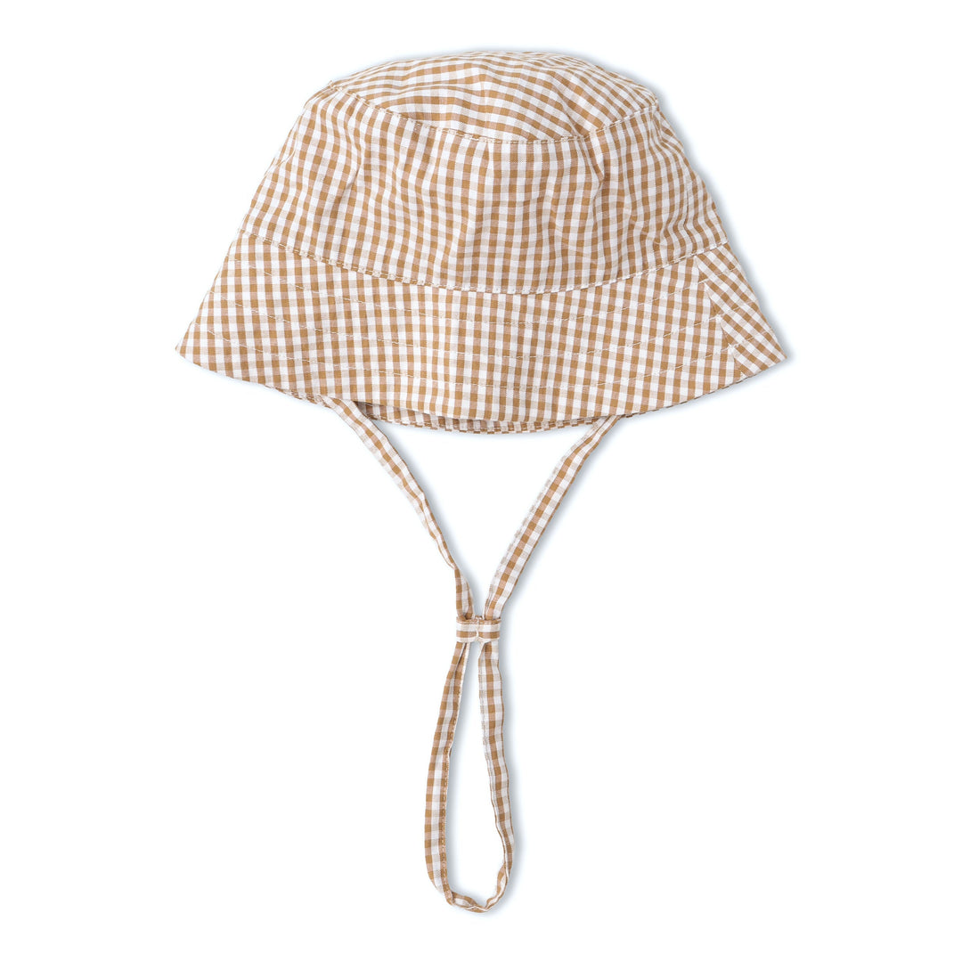 Toddler wearing MakeMake Organics Caramel Check Sun Hat - wide brim organic baby hat for summer