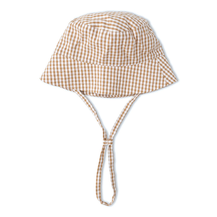 Toddler wearing MakeMake Organics Caramel Check Sun Hat - wide brim organic baby hat for summer