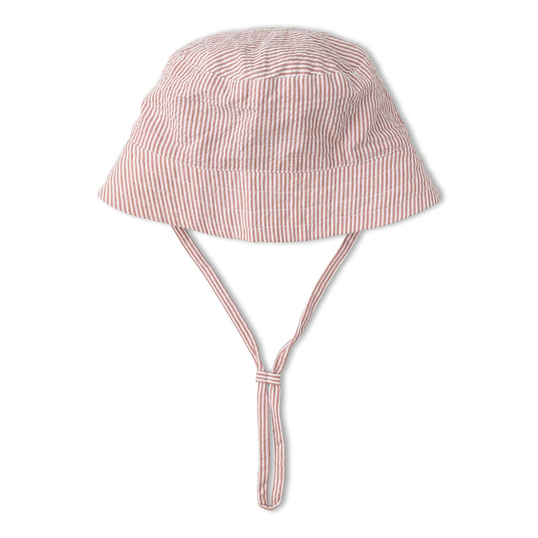 Baby wearing MakeMake Organics Coral Stripes Bucket Sun Hat outdoors - wide brim toddler UV hat