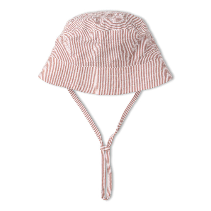 Baby wearing MakeMake Organics Coral Stripes Bucket Sun Hat outdoors - wide brim toddler UV hat