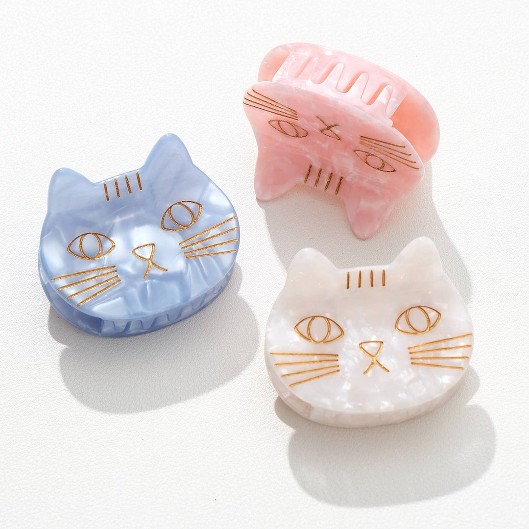 Adorro Saltwater Kitty Cat Claw Clip flat lay showing all three Saltwater colors Pink Blue and Ivory arranged together on neutral background