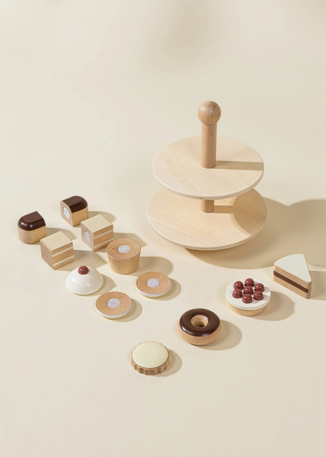 Colorful and detailed, the Coco Village Wooden Desserts Tower is a stunning play food set designed for toddler pretend play.