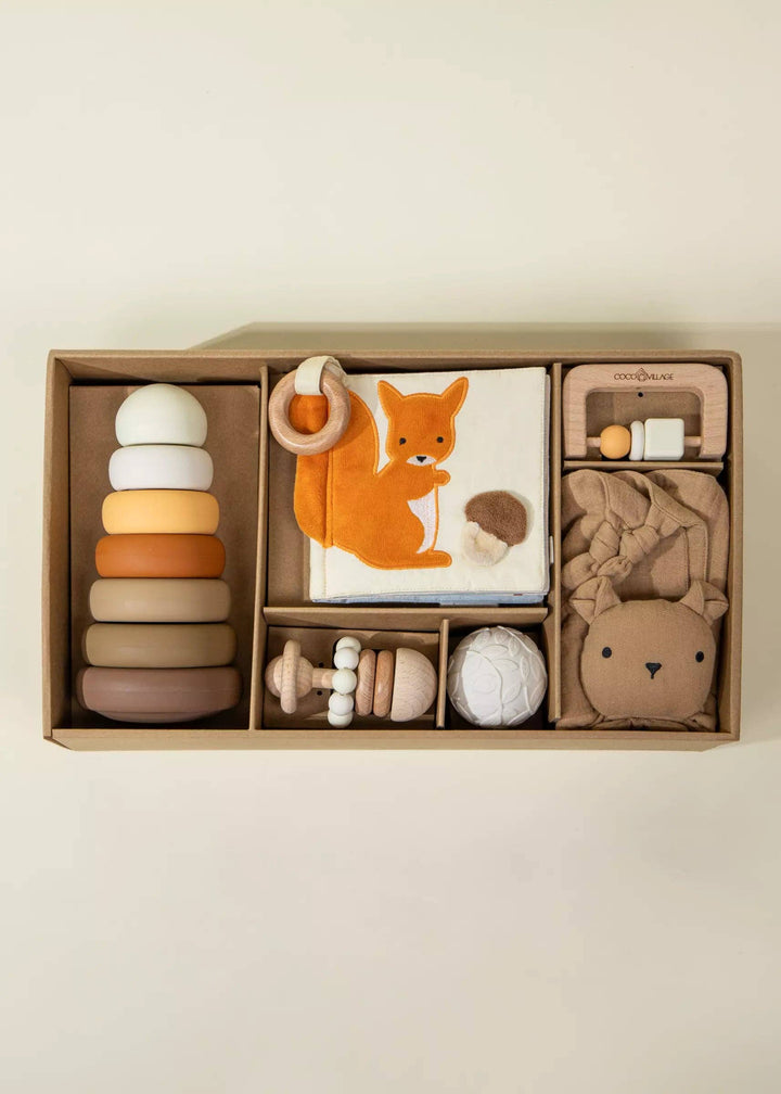 Bright colors and gentle textures make the Coco Village Baby First Toys Gift Box a beloved baby toy set for nurturing early development.