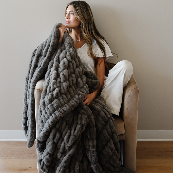 Cobblesone turns everyday lounging plush with this luxe Saranoni Double Ruched Faux Throw Blanket, a Soft baby blankets steal.