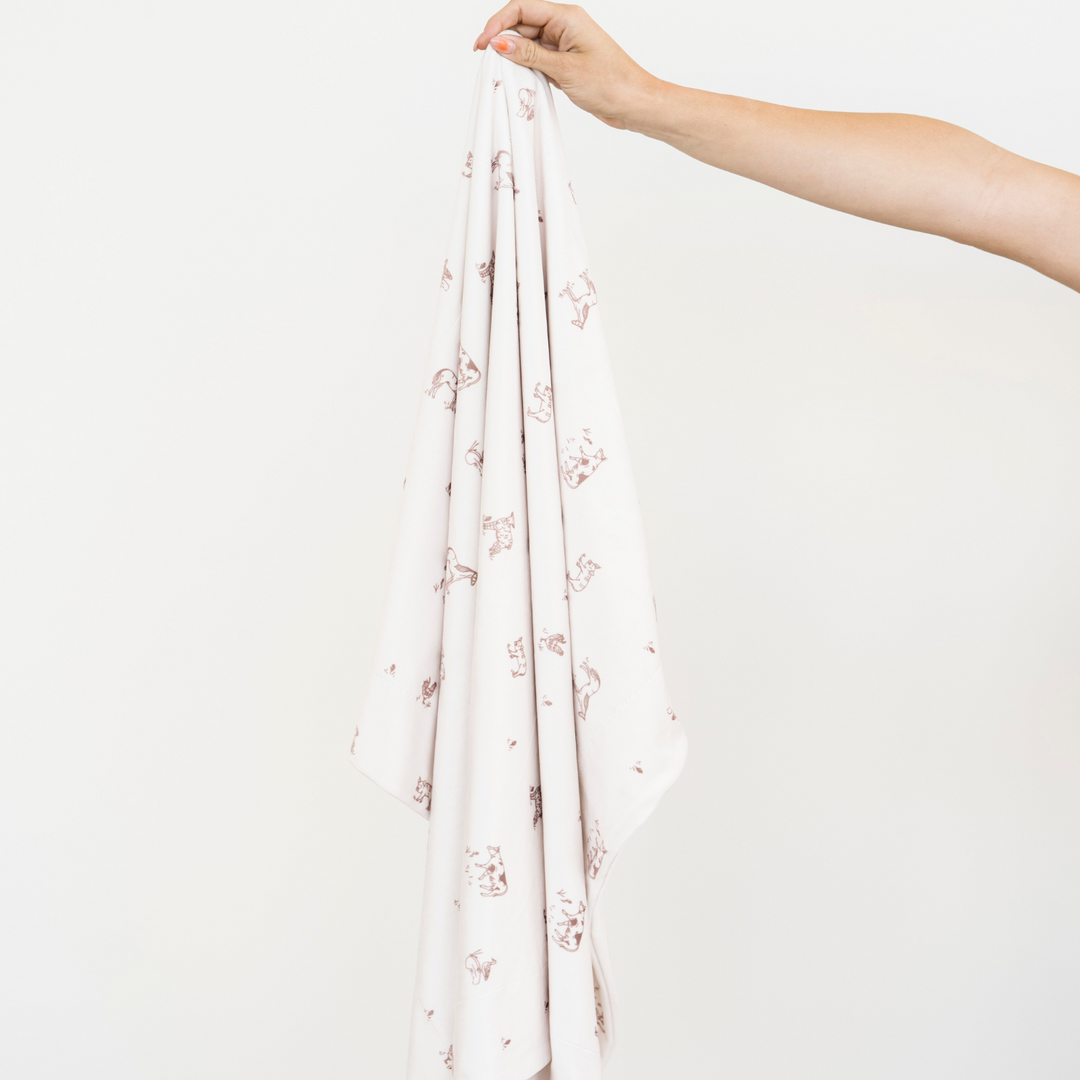Soft yet durable, the Saranoni Minky Stretch Receiving Blanket in Farm Animals makes one of the best baby blankets for daily use.