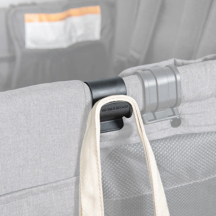 Mounted on a twins stroller, Wonderfold black Bag Hooks provide convenient storage for parents during outings