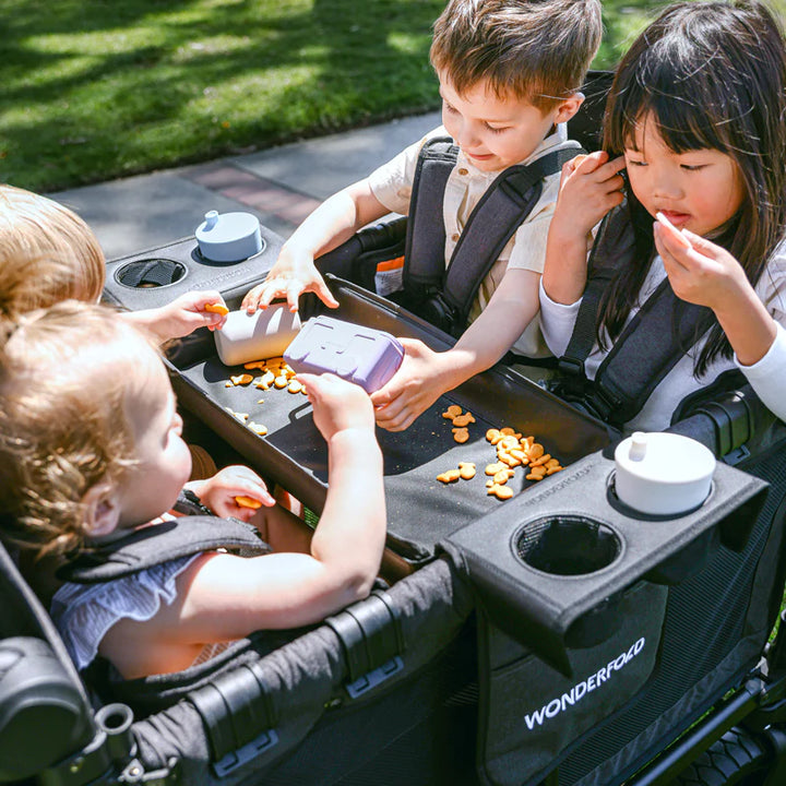 Adding functionality to your ride, the Wonderfold Snack Tray fits a doble stroller with space for snacks and drinks