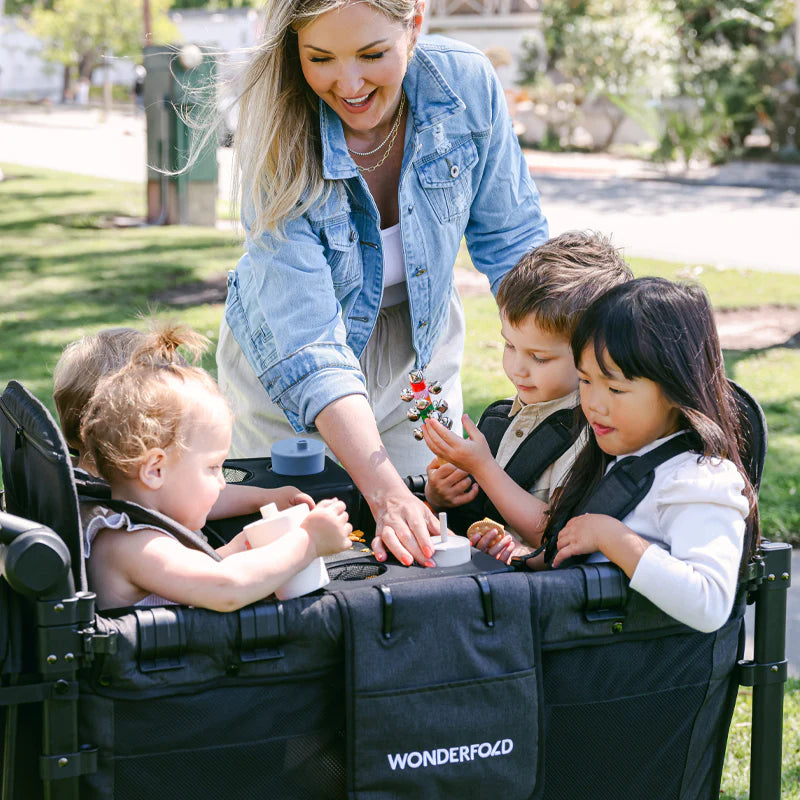 Installed Wonderfold Flex Snack Tray on the W4 wagon, perfect stroller accessory for mealtime versatility.