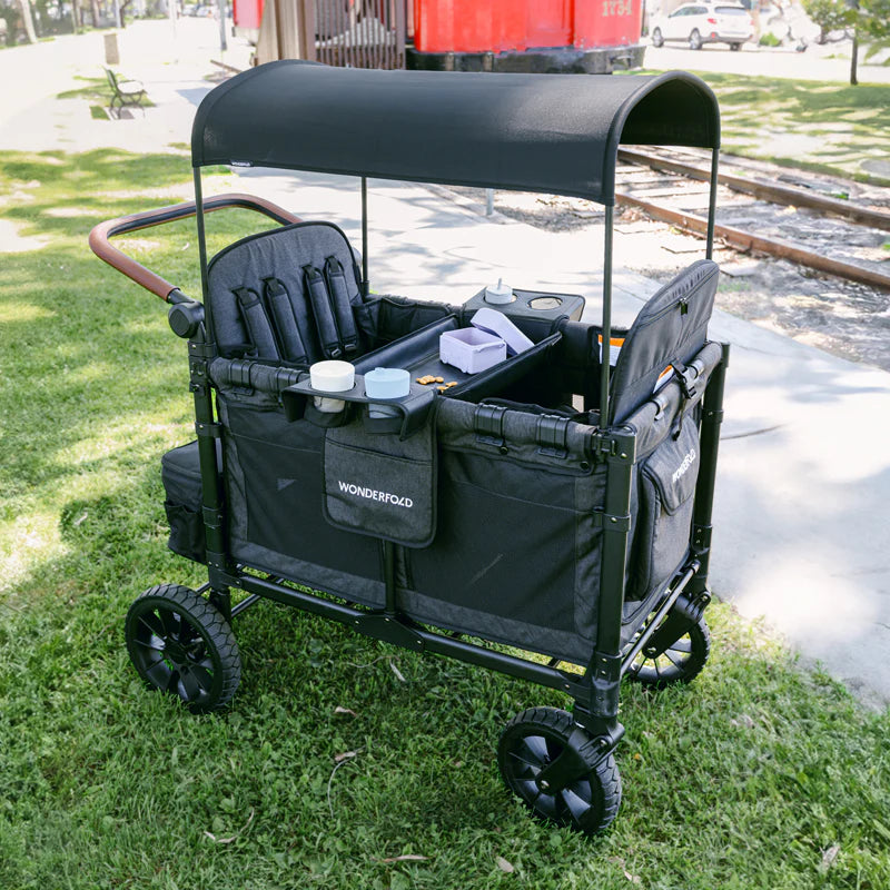 W4 stroller wagon in action with the Wonderfold Flex Snack Tray, keeping snacks secure and accessible.