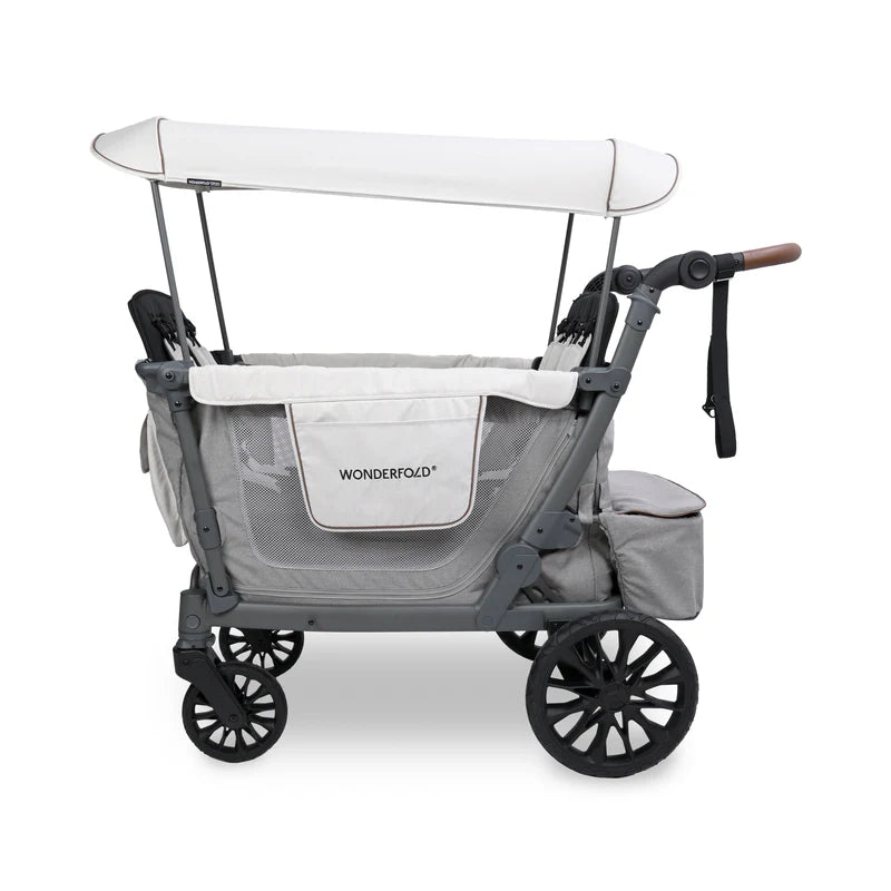 Spacious seating in the Wonderfold L4 Quad Stroller Wagon Grey makes it ideal for baby stroller outings.